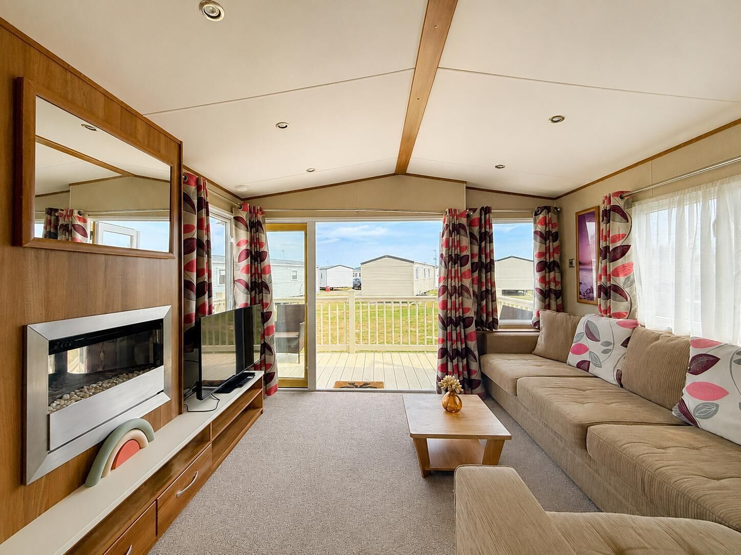 This spacious lounge area is the perfect place to relax with the whole family. Enjoy snuggling down on the sofa with a movie on the tv