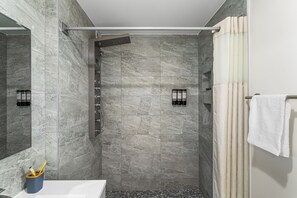 Shower, towels, shampoo - Bright 1BR, Private Balcony, Parking, Near NYC (East Orange)