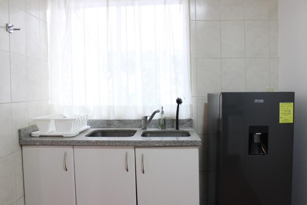 Family Apartment, Patio, Garden View | Private kitchen