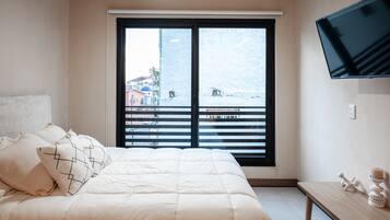 Ferros/tábuas de passar roupa, acesso à internet, roupa de cama