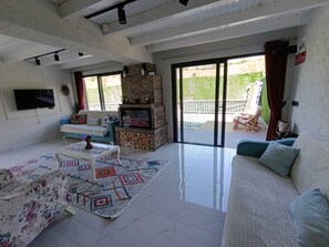 Vila luxo, vista para a piscina | Área de estar