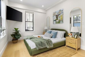 2 habitaciones, tabla de planchar con plancha y cuna de viaje 