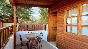 Standard Cabin, Patio, Pool View | Outdoor dining