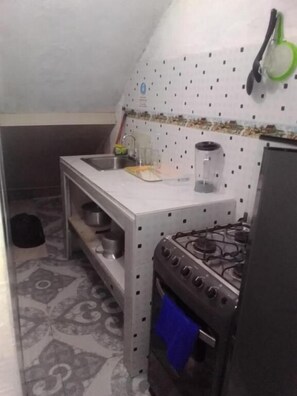 Apartemen Keluarga, pemandangan halaman | Dapur pribadi