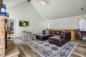 Smart TV, fireplace, books, offices
