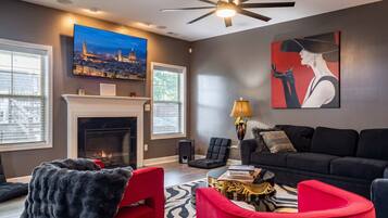 Smart TV, fireplace, ping pong, books