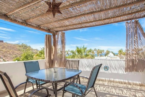 There’s an outdoor dining table for entertaining