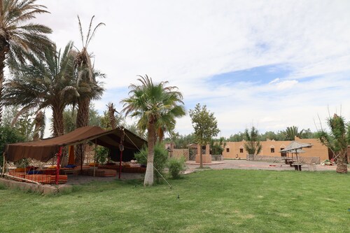 Room in a farmhouse with terrace and garden in the heart of the palm grove
