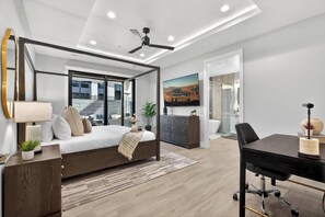 A modern bedroom with a four-poster bed, a desk, and a large window. - Modern 7-bed Luxury retreat in Hurricane (Hurricane)