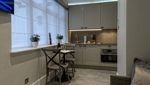 Interior - Deluxe Lower ground studios by Dmontrio (London)