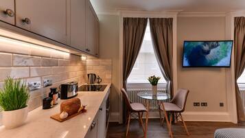 Coffee/tea maker, fridge, microwave, toaster