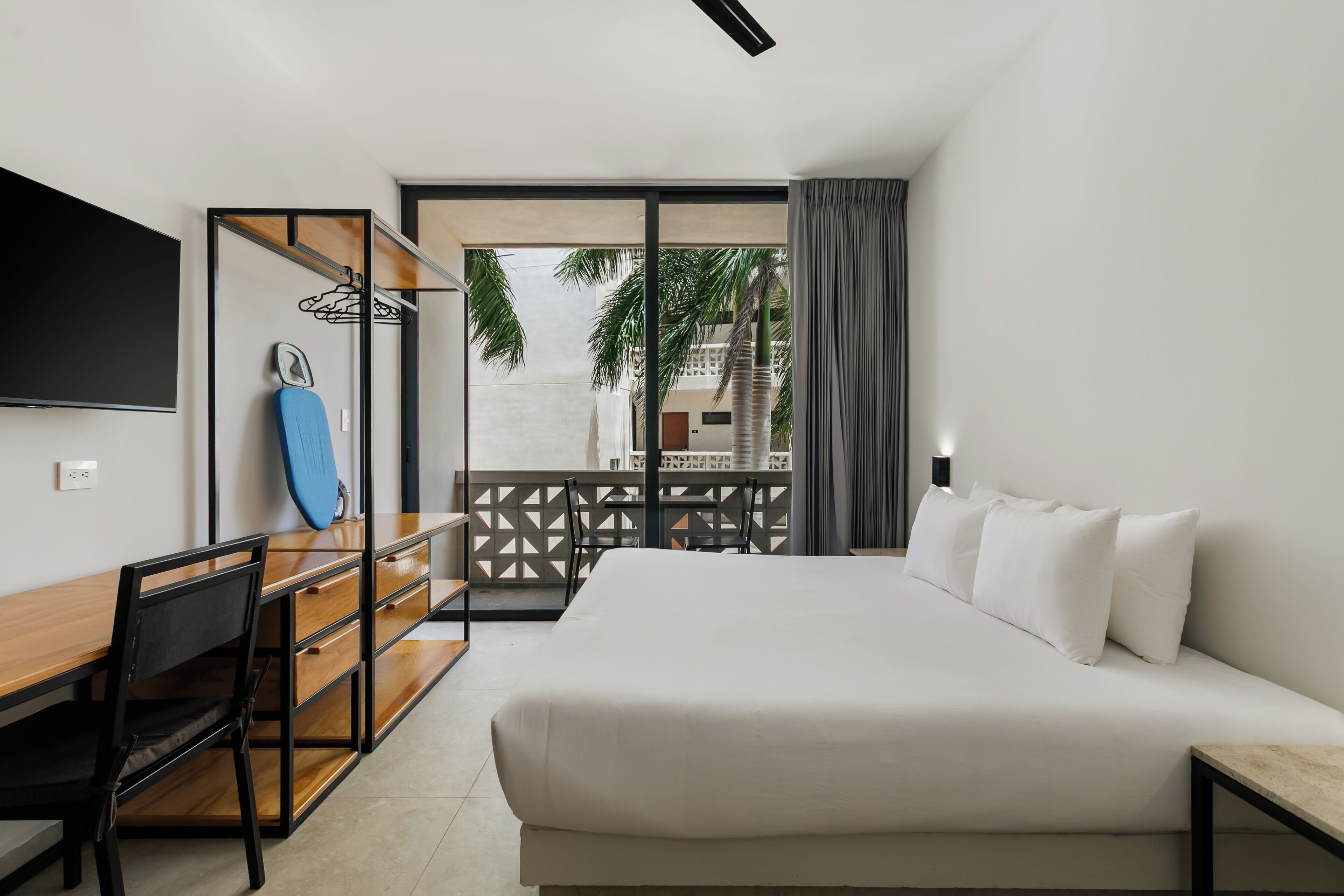 Deluxe Apartment, Balcony, Courtyard View | Desk, laptop workspace, iron/ironing board, free WiFi
