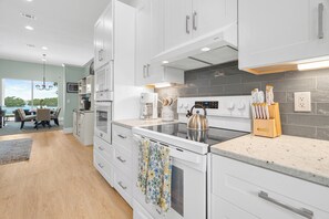 Fridge, microwave, oven, stovetop - Grand Oak at Seaview | Waterfront + Private Heated Pool (Sarasota)