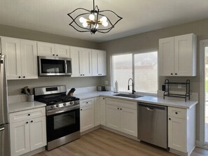 Private kitchen - Tranquil 4BD/2BA Home Base in the Center of Ontario, with a large back yard! (Ontario)