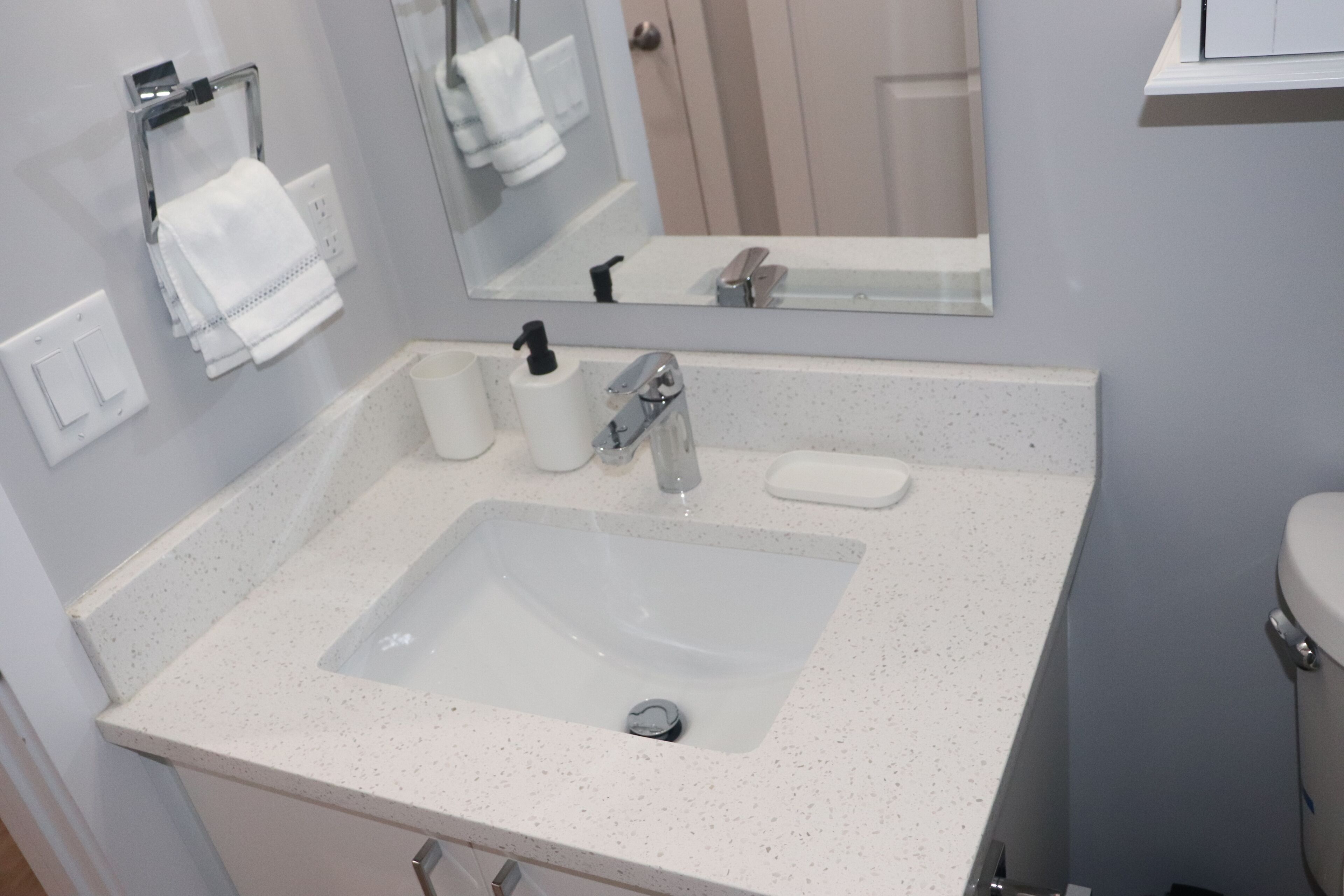 Hair dryer, towels, soap, toilet paper