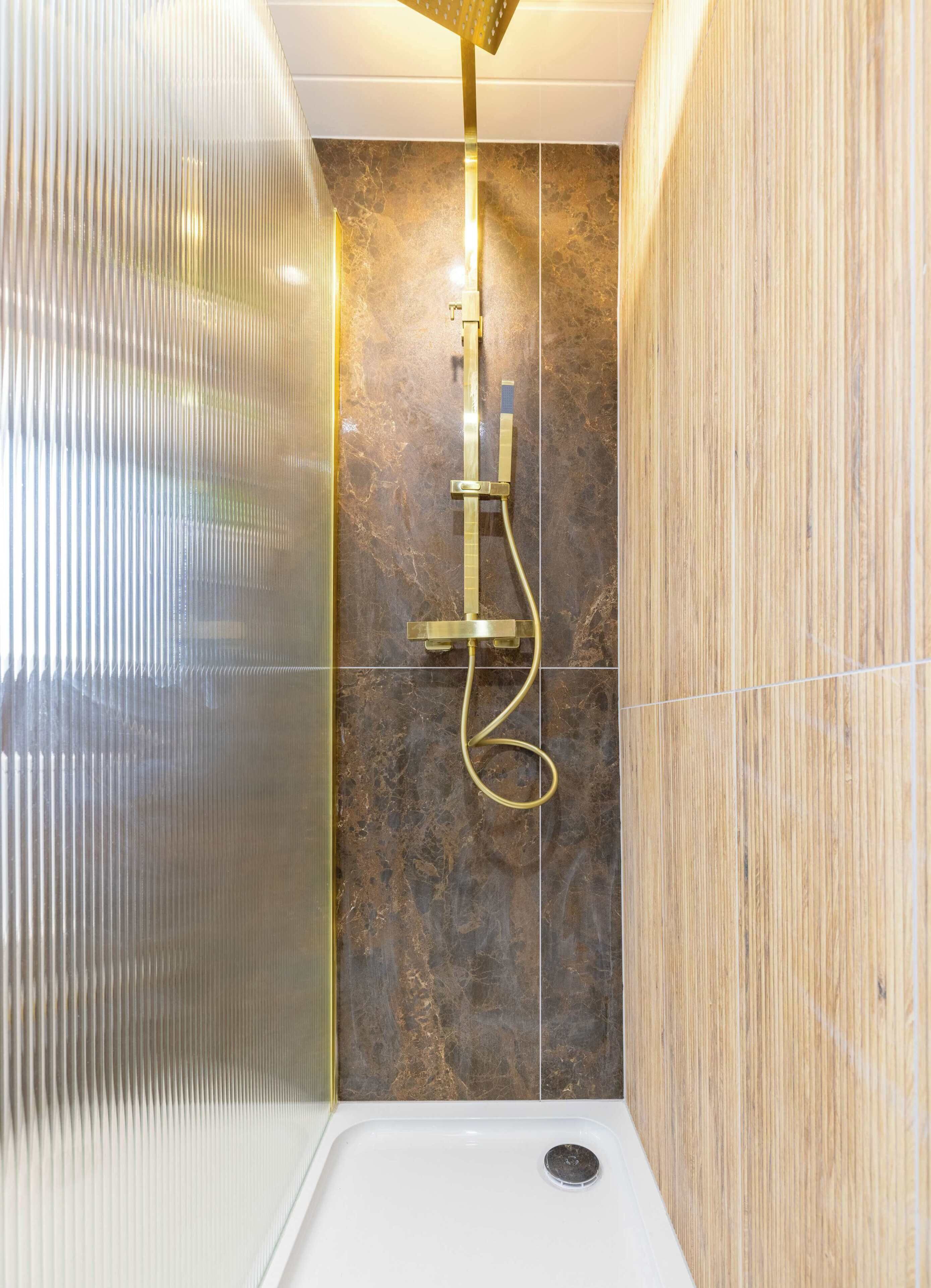 Shower, hair dryer, towels, shampoo