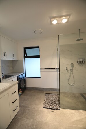 Shower, hair dryer, towels, soap