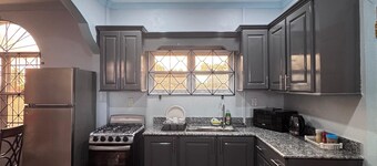 Marvelous 2-bedroom condo with AC, hot and cold water, in Crabwood Creek!