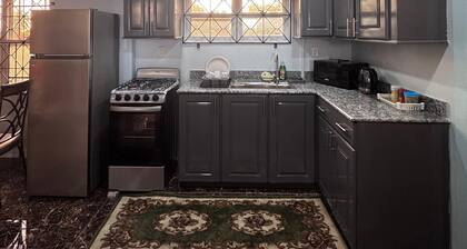 Marvelous 2-bedroom condo with AC, hot and cold water, in Crabwood Creek!