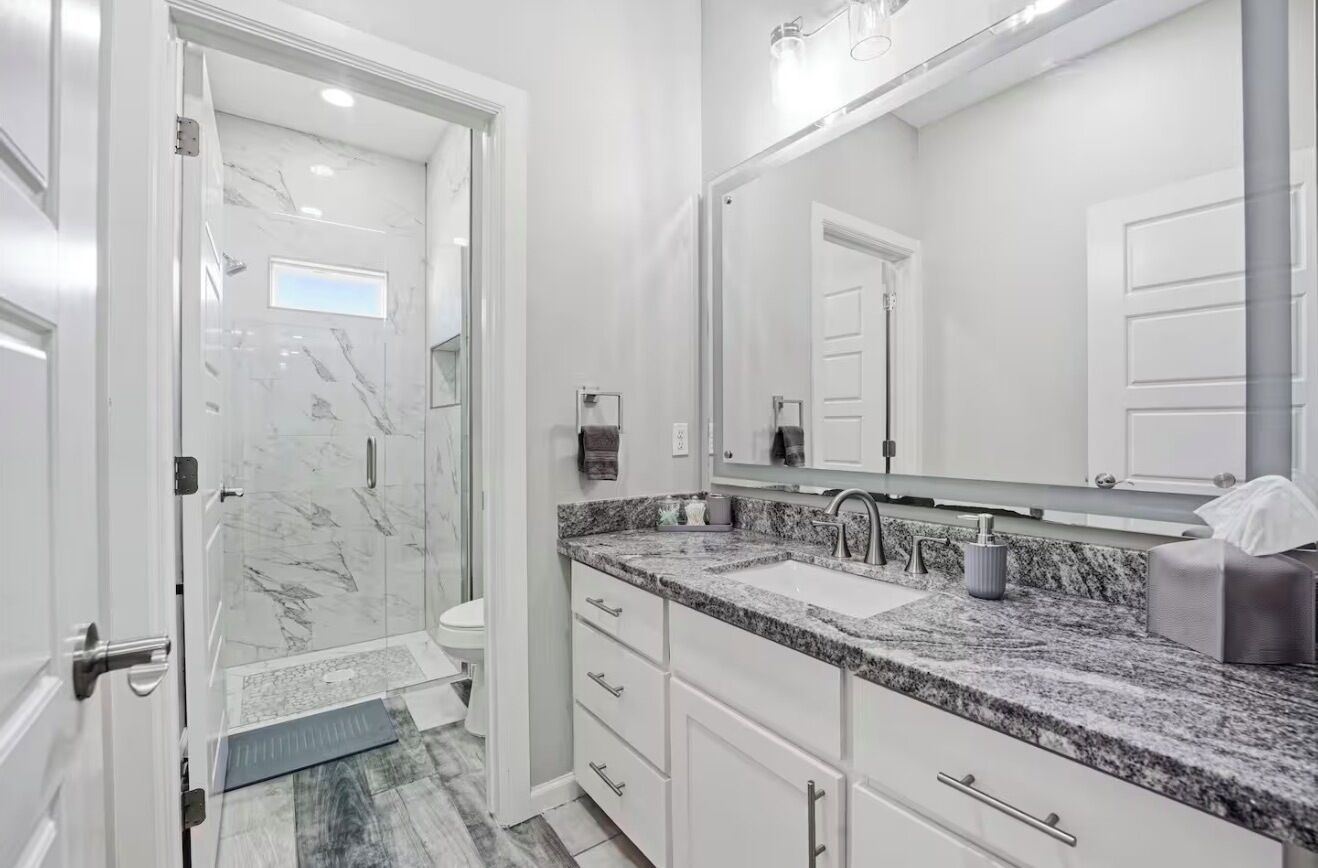 Shower, jetted bath, towels, soap