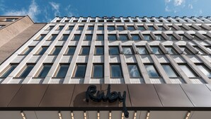 A building with a 'Ruby' sign, a grid of windows, and a modern architectural design. - Ruby Frida Hotel Stockholm By IHG (Stockholm)