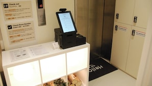 Check-in/check-out kiosk