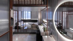 A modern hotel room with a bunk bed, a large mirror, a bedside table, and a view of the city. - NOA HOTEL XIAMEN (Xiamen)