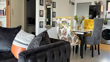 Apartment, 2 Bedrooms, Balcony | Living area | Books