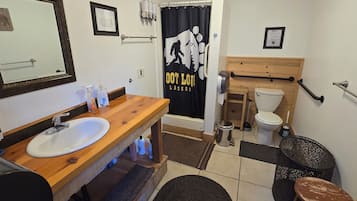 Shower, towels, soap, toilet paper
