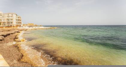 Seafront Gozo Escape BBQ Backyard by Qbajjar Bay