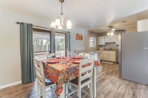 House, Multiple Beds, Kitchen, Garden View (Whimsical Escape) | Dining - Whimsical Escape in Ocean Springs (Ocean Springs)