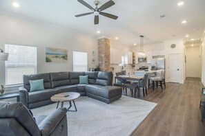 House, Multiple Beds, Fireplace, Pool View (Beach Retreat) | Living area - Retreat at Gaston Point (Gulfport)