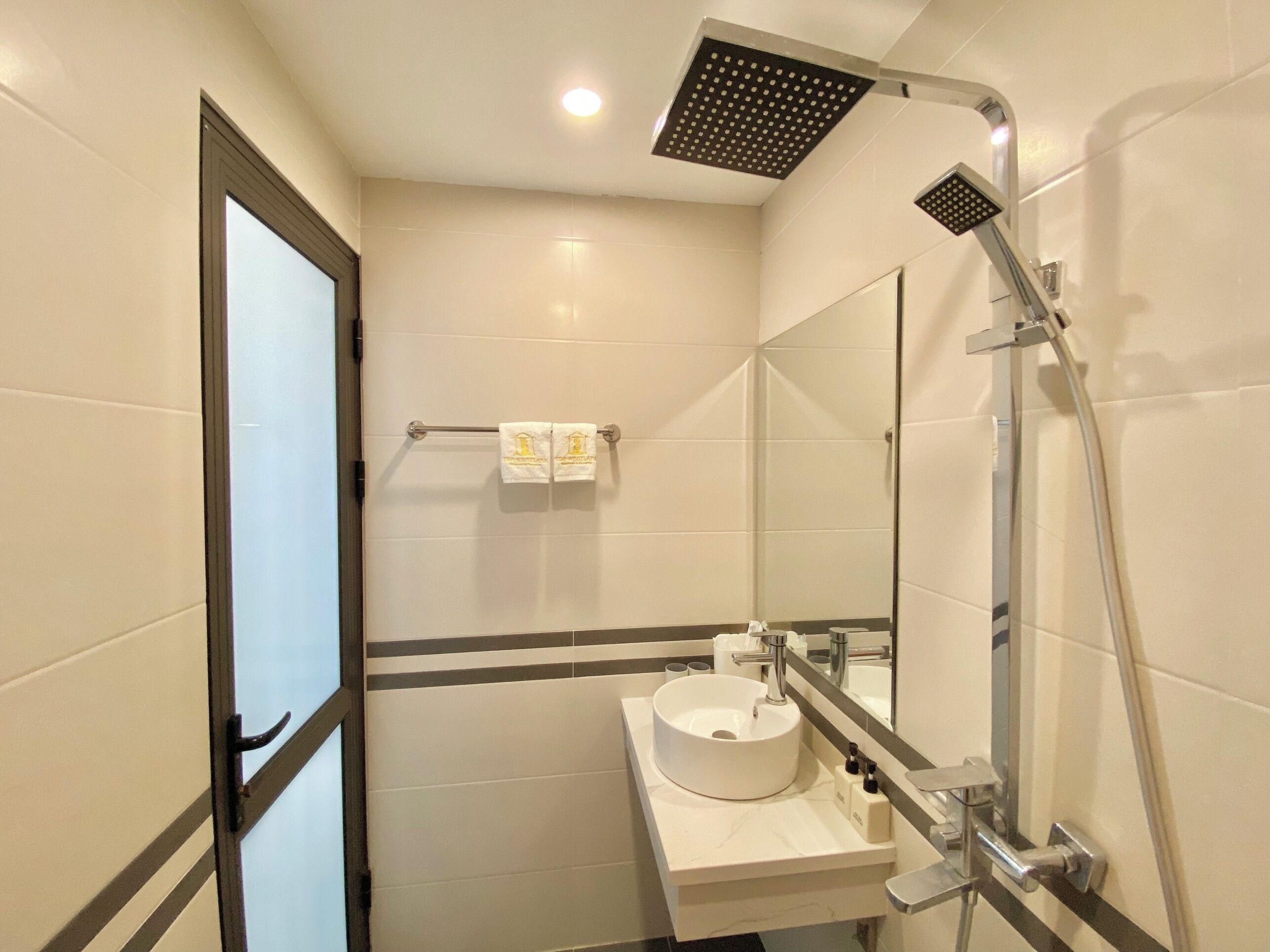 Shower, free toiletries, hair dryer, slippers