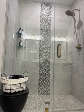 Shower, hair dryer, towels, soap