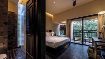 Deluxe Double Room, Garden View | Minibar, in-room safe, free WiFi, bed sheets