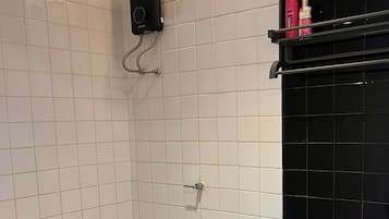Double Room, City View | Bathroom | Shower, free toiletries, hair dryer, towels