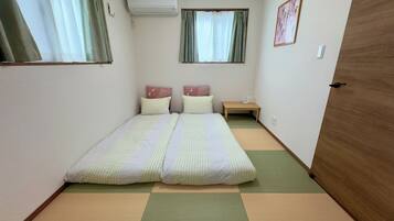 Desk, laptop workspace, blackout curtains, iron/ironing board