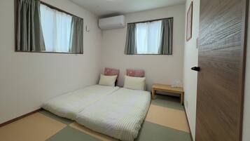 Desk, laptop workspace, blackout curtains, iron/ironing board