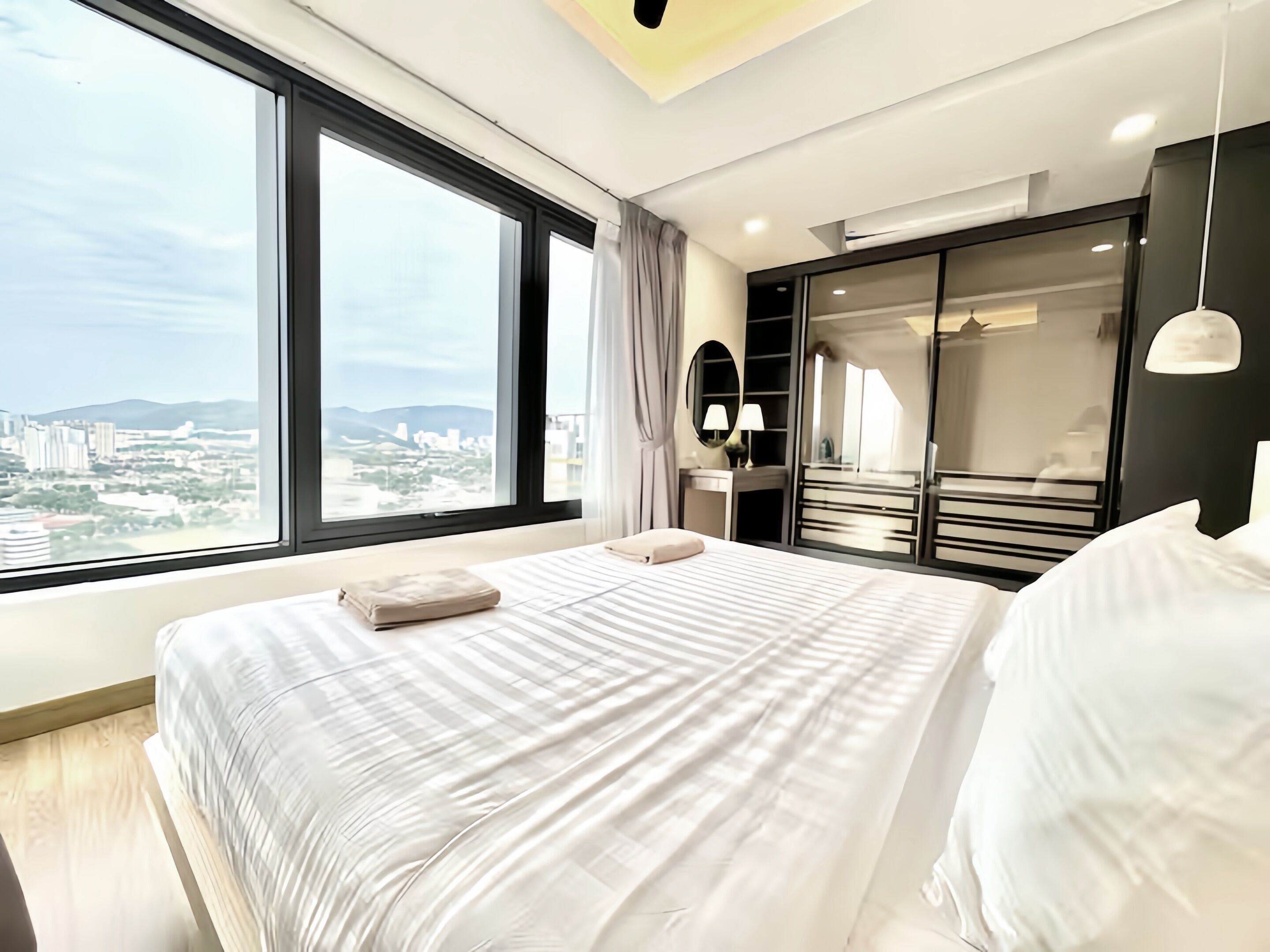 Deluxe Apartment, 2 Bedrooms, City View | Down comforters, desk, iron/ironing board, free WiFi