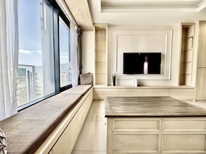 Deluxe Apartment, 2 Bedrooms, City View | Living area | LED TV - Tropicana 218 Macalister by Local Host (George Town)