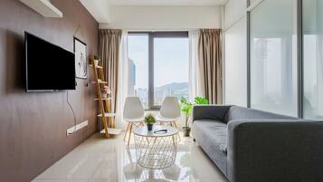Apartment, 2 Bedrooms, City View | Living area | LED TV