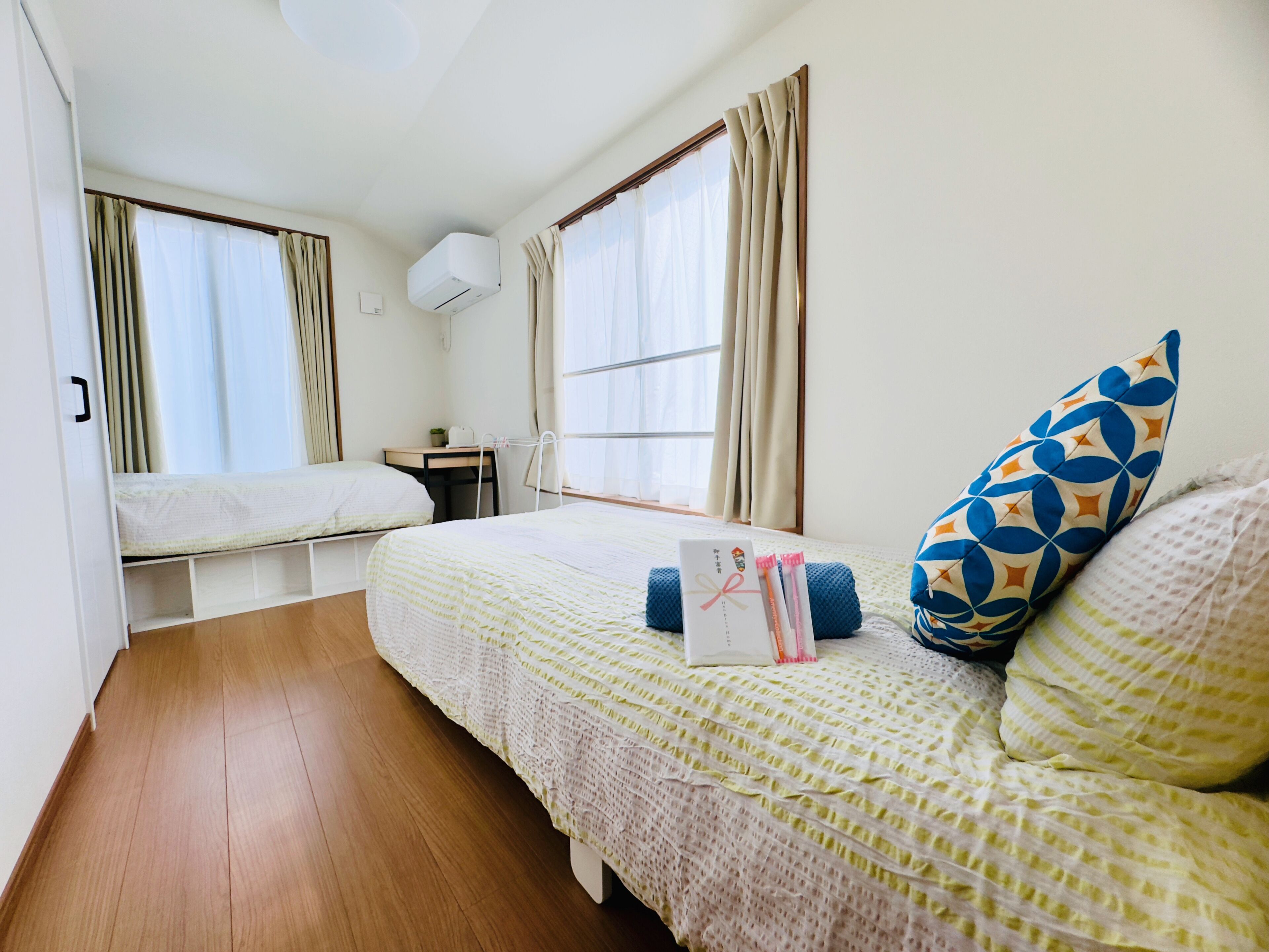 Desk, laptop workspace, blackout curtains, iron/ironing board