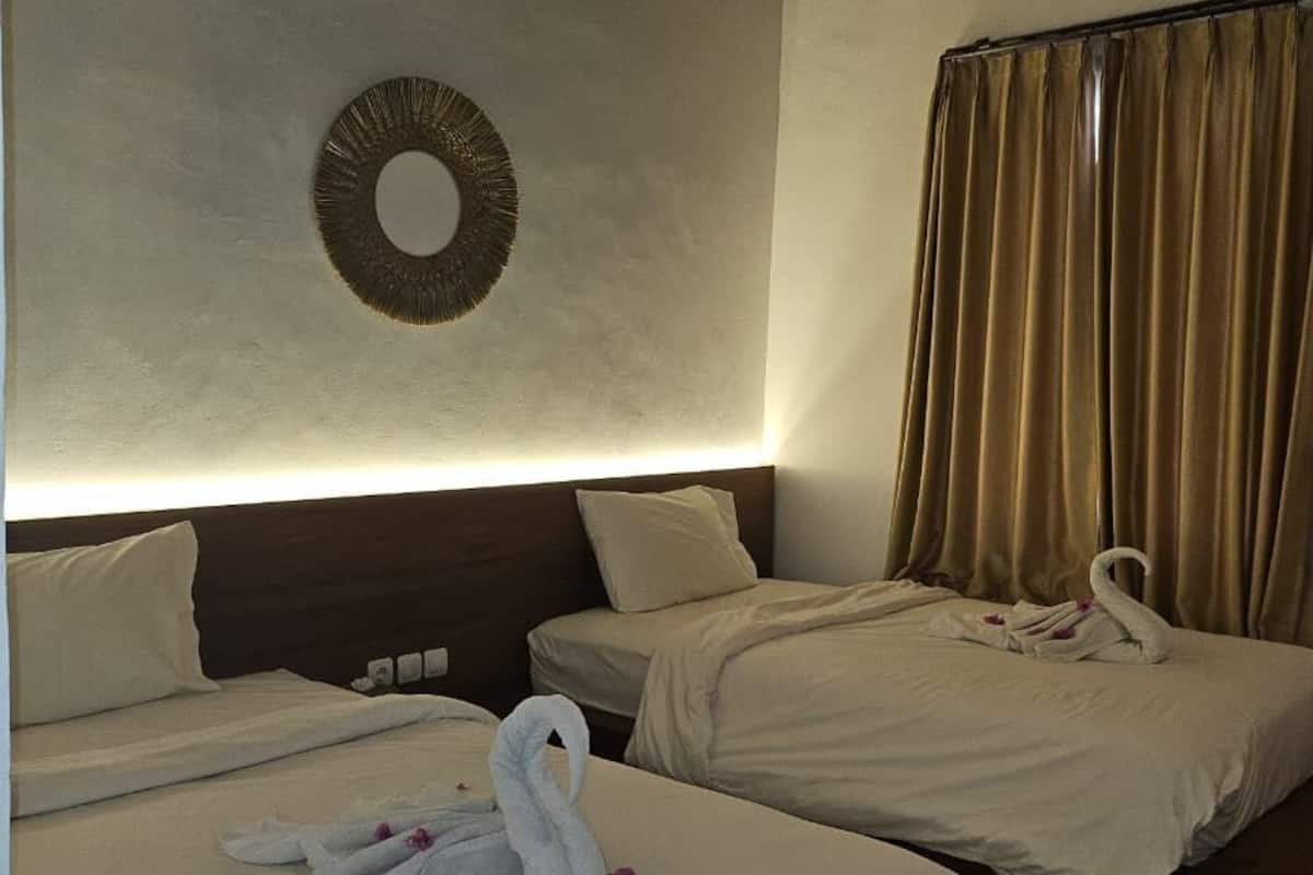 Blackout drapes, WiFi (free), bed sheets