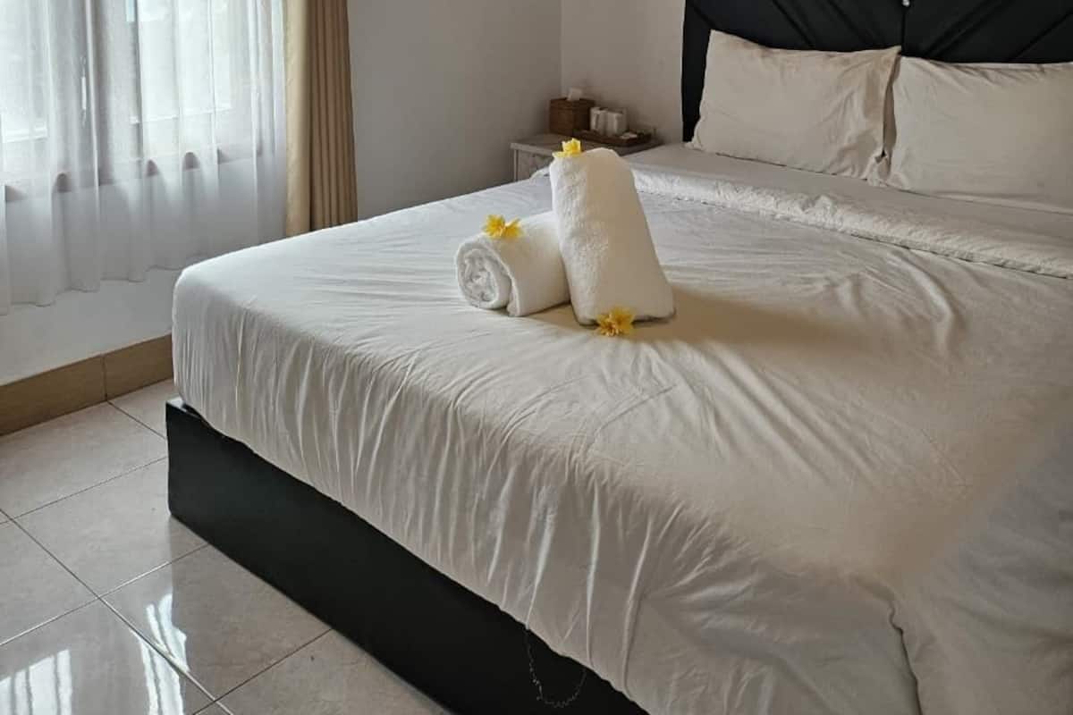 Blackout drapes, WiFi (free), bed sheets