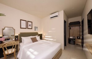 Doppia Deluxe, vista giardino | Minibar, una scrivania, insonorizzazione, Wi-Fi gratuito