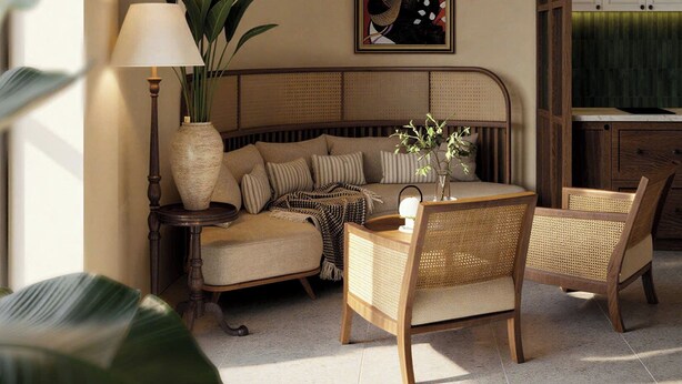 A living room with a sofa, two wicker chairs, a ceiling fan, a table with a vase, and a painting on the wall. - LoverA Signature Hotel (Ho Chi Minh City)
