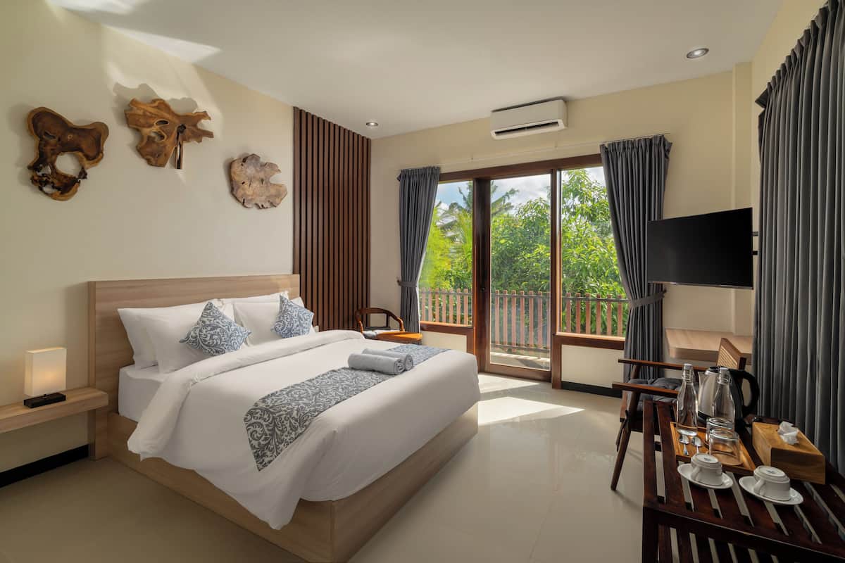 Apartamento luxo, vista para o jardim | Wi-Fi de cortesia, roupa de cama