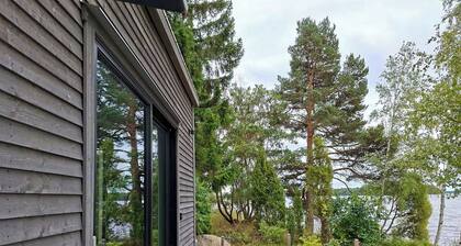 Cottage with lake view and boat at Lake Storsjön