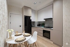 Private kitchen - Modern Apartment in Alfraganus  Rent Car & Moto (Tashkent)