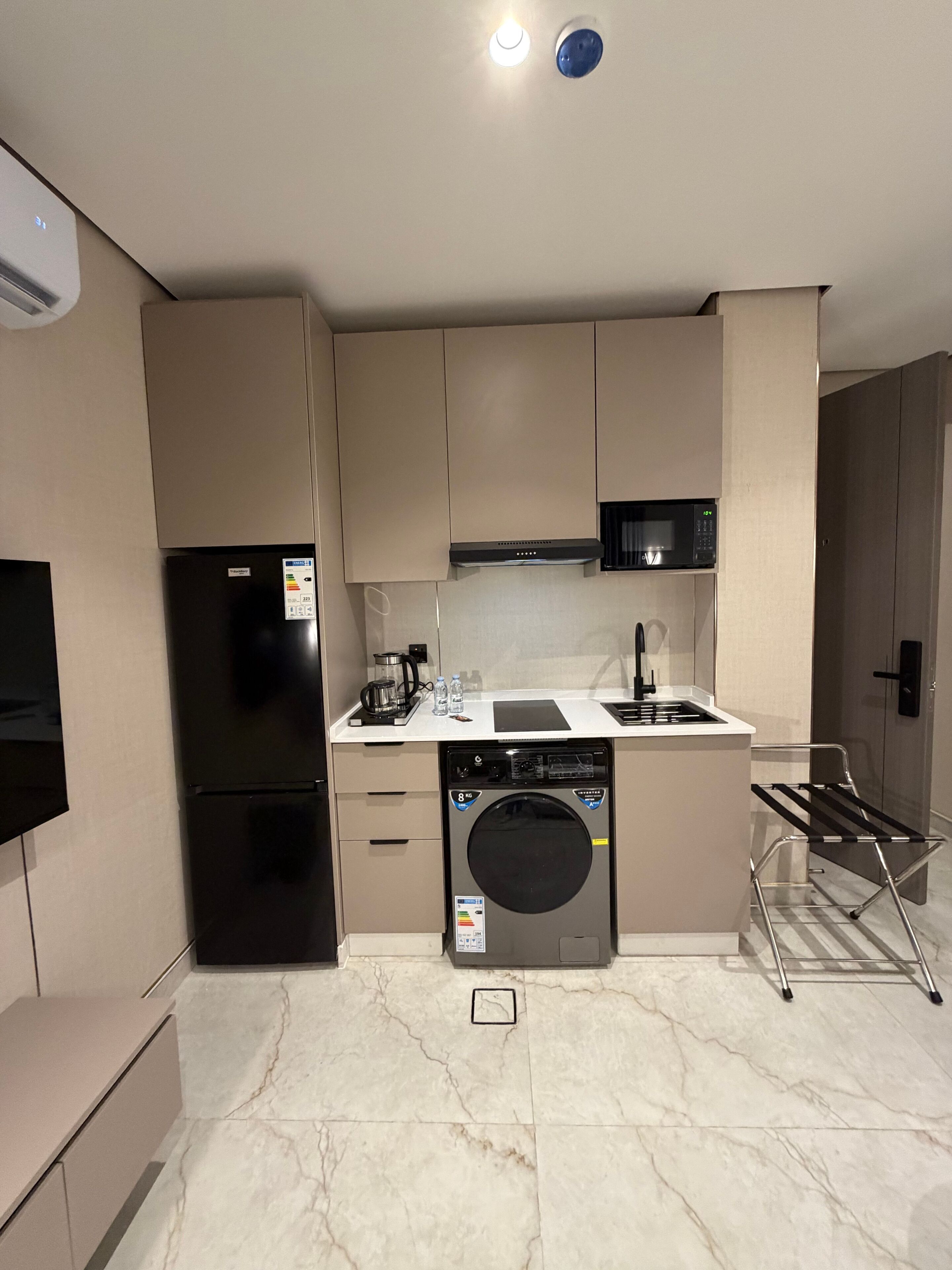 Fridge, microwave, cookware/dishes/utensils